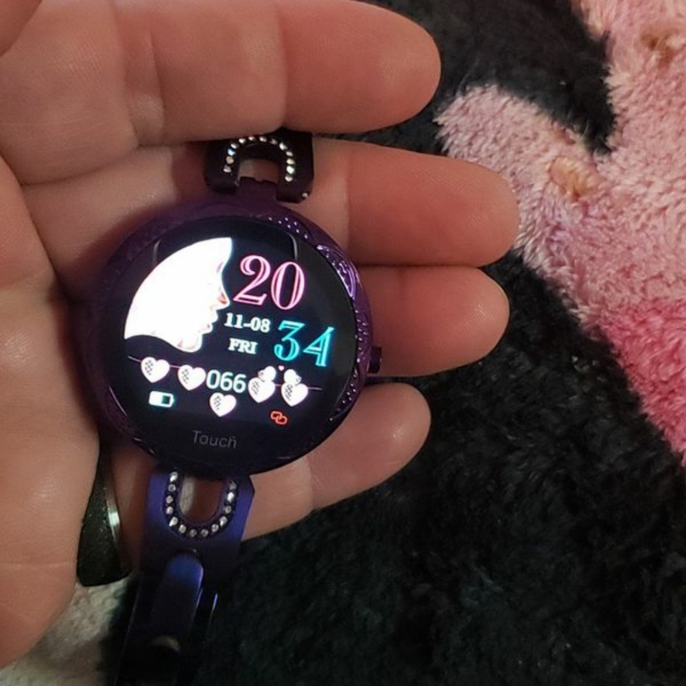 NIB!  A Ladies' Smartwatch heart & phone +  Purple
